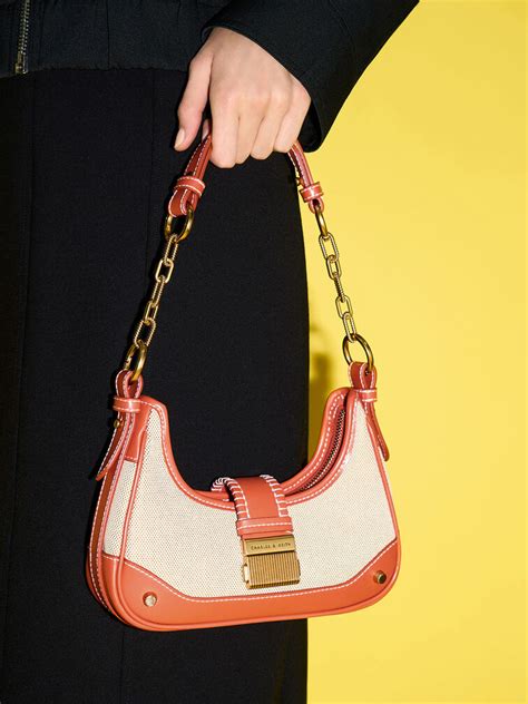 Orange Winslet Canvas Belted Hobo Bag .